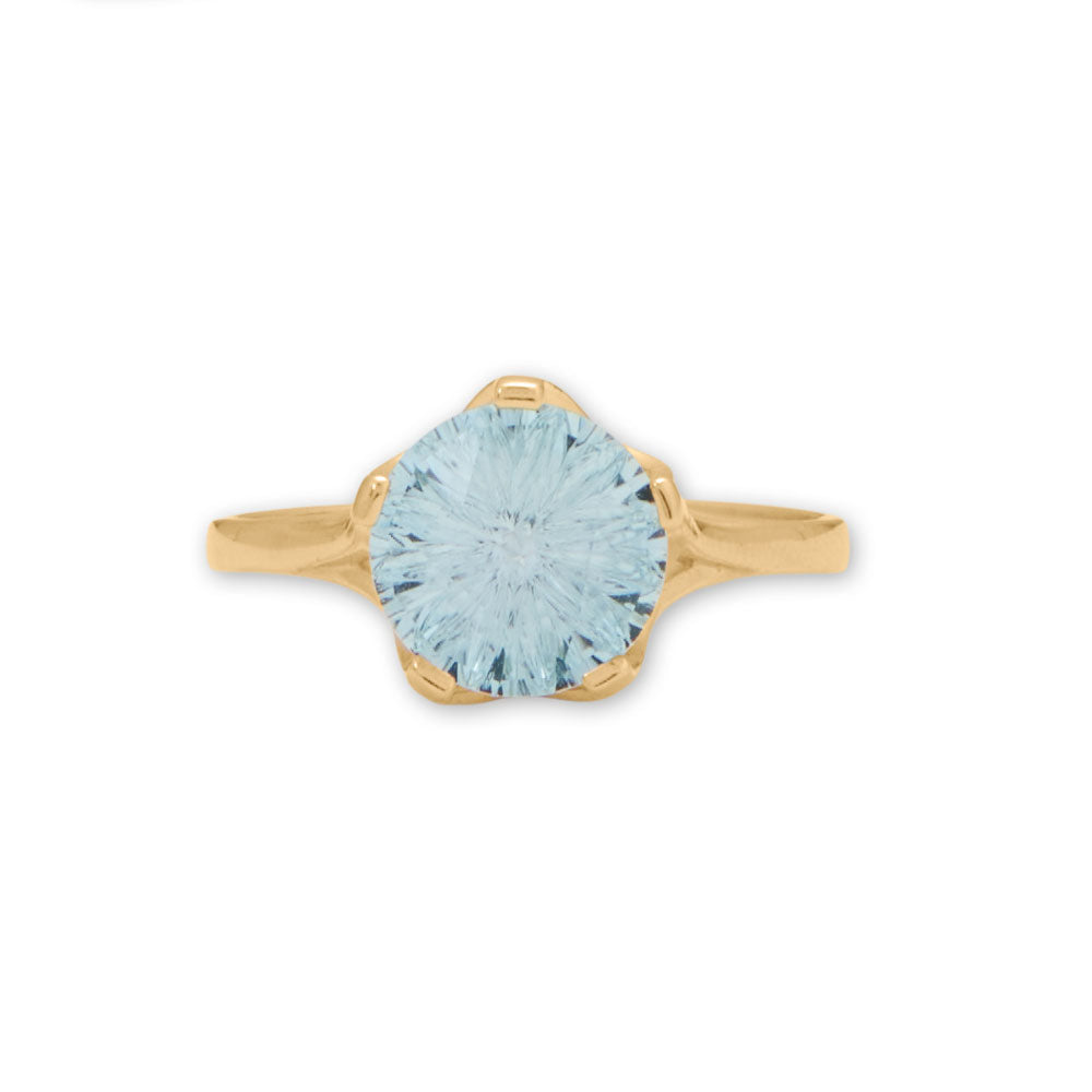 Capture pure elegance with this sky blue topaz ring! 14kt gold ring features a 9mm precision cut blue topaz in openwork detail setting. Ring is available in whole sizes 6-8. Ring is packaged in a gift box. 14kt Gold