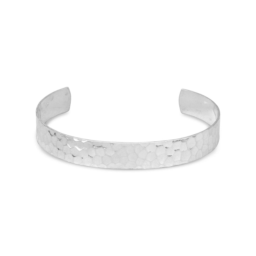 Indulge in the exquisite elegance of our 7" sterling silver hammered cuff bracelet. Adjustable and 9.5mm wide, it effortlessly captures attention. Perfectly paired with our other polished sterling silver pieces, this .925 treasure is a must-have for any luxury collection.