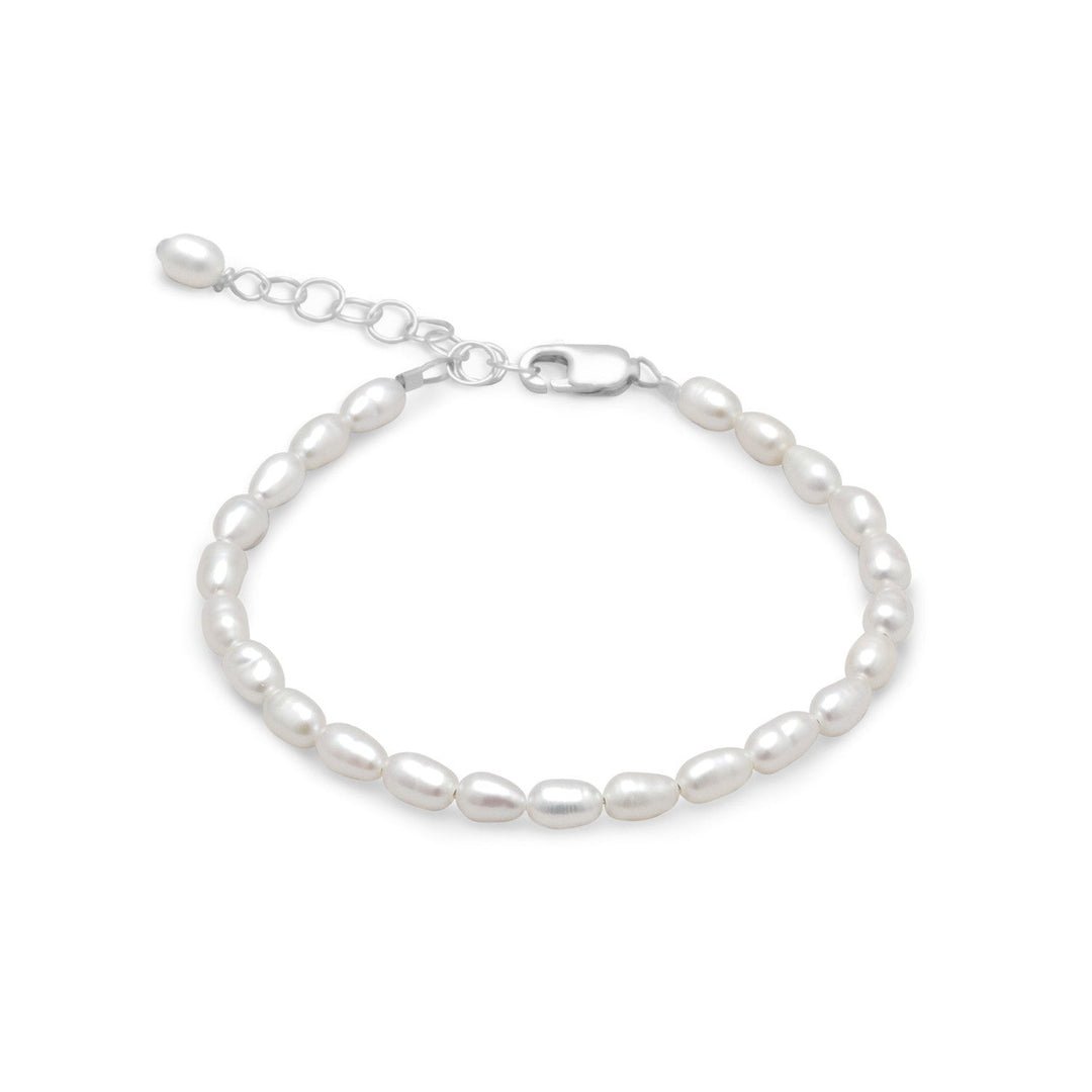 Introducing our exquisite 5" + 1" sterling silver bracelet, a stunning piece of jewelry that is sure to captivate the senses. This bracelet boasts a delicate and elegant design, featuring a 3.5mm x 5mm white rice pearl bracelet that exudes a timeless beauty.