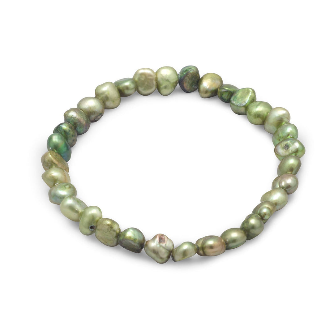 Introducing the Dyed Green Cultured Freshwater Pearl Stretch Bracelet, a stunning piece of jewelry that exudes elegance and sophistication. This bracelet features a collection of cultured freshwater pearls that have been expertly dyed to achieve a beautiful green hue. The pearls range in size from 6mm to 8mm, creating a dynamic and visually appealing aesthetic.