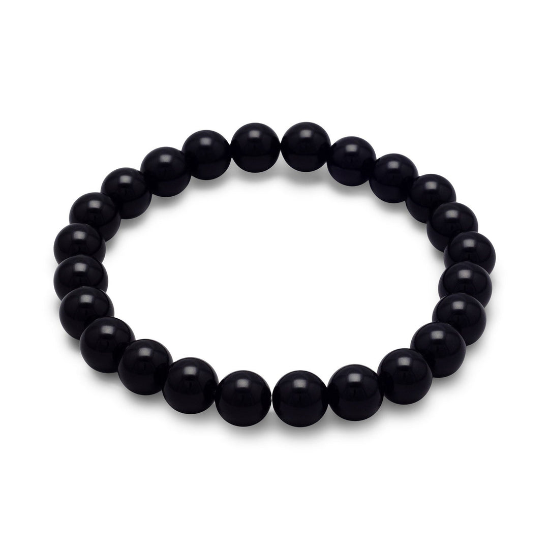 Introducing the 8mm Black Onyx Bead Stretch Bracelet, a stunning piece of jewelry that exudes elegance and sophistication. Crafted from high-quality black onyx beads, this bracelet is designed to complement any outfit and add a touch of glamour to your look. Black onyx is a type of chalcedony that is known for its deep black color and smooth texture.