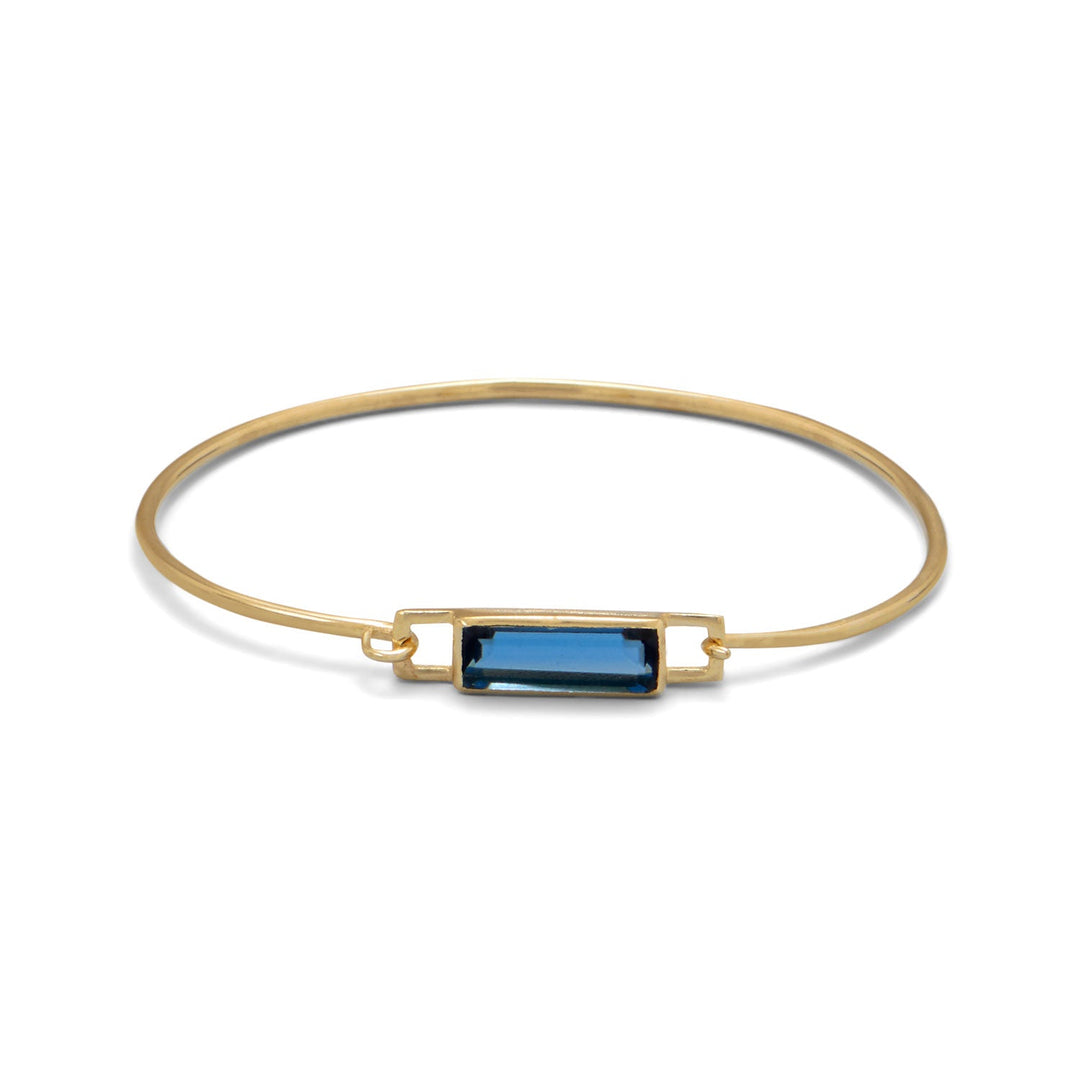 Ideal for those with dainty wrists,Indulge in luxury with our 14K gold plated bangle, adorned with a captivating hydro glass rectangle.