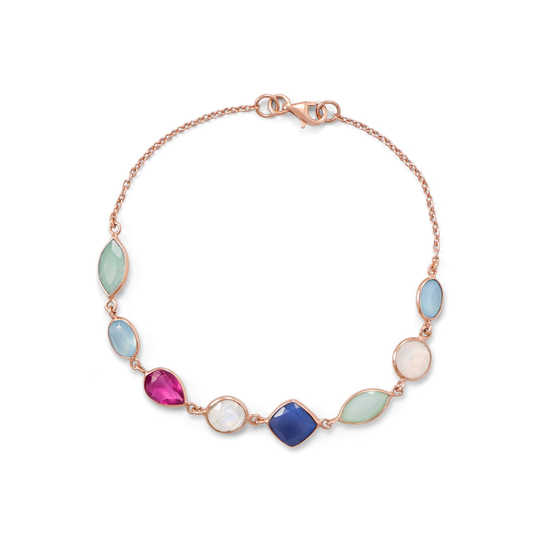 Introducing our exquisite Colorful Gems Bracelet, a true masterpiece of luxury. Crafted with precision, this 14 karat rose gold plated sterling silver cable chain showcases a dazzling array of bezel set and faceted gemstones. Made from .925 sterling silver composition, this bracelet is not only a symbol of beauty but also of exceptional quality. A perfect gift for any fashion-conscious woman, this Colorful Gems Bracelet is sure to leave a lasting impression.