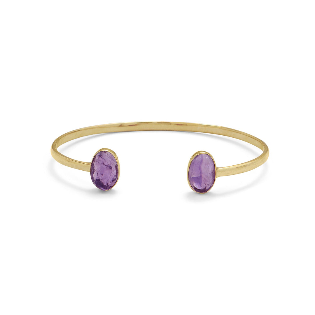 14 karat gold plated sterling silver 3mm wide cuff features 8mm x 11.9mm bezel set rough cut amethyst on both ends. This cuff is slightly adjustable to fit most wrists.<br>.925 Sterling Silver