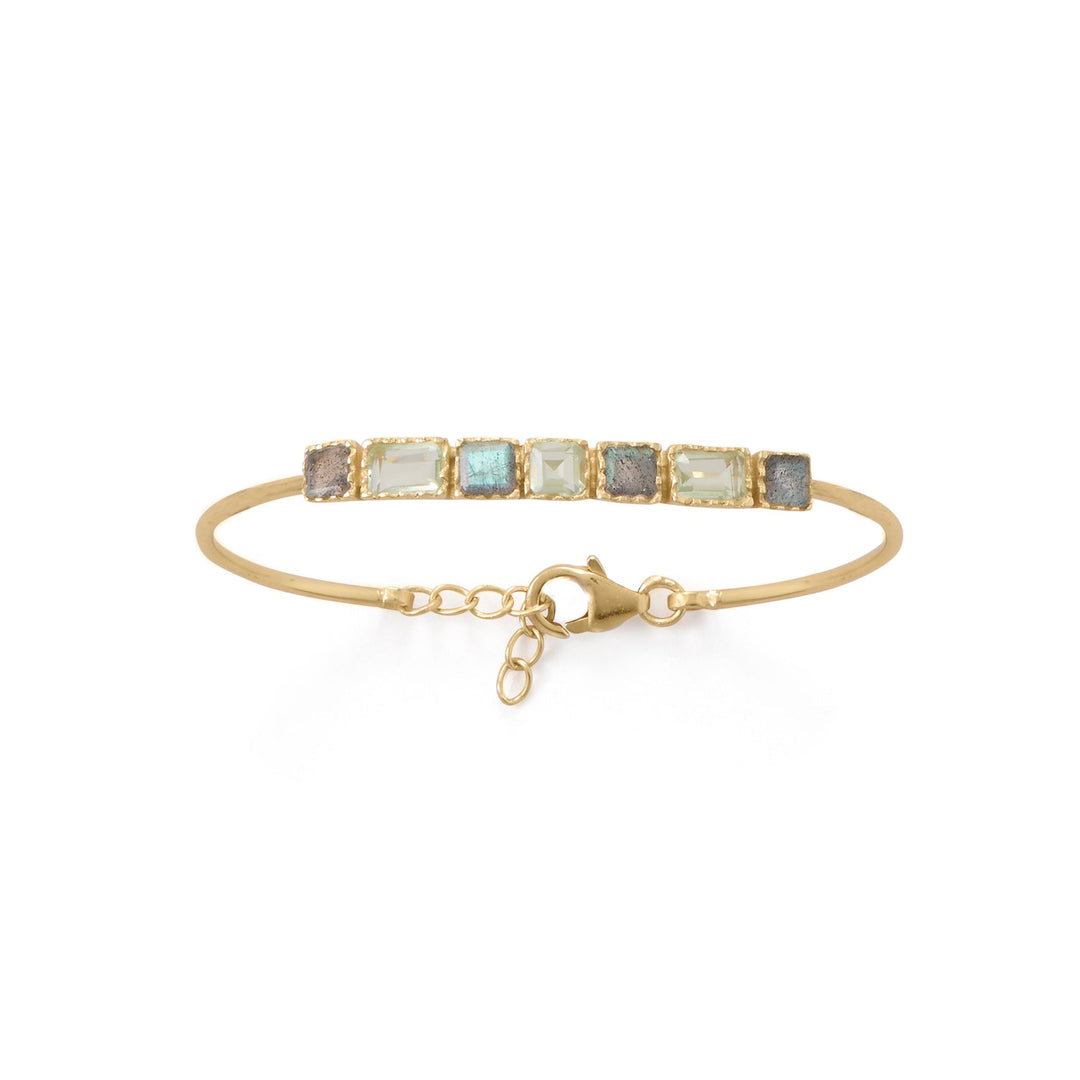 Indulge in the opulence of our 7" bracelet, crafted from 14 karat gold plated sterling silver. Adorned with 4mm square labradorite and prasiolite stones, this piece exudes earthy sophistication. The lobster clasp closure and safety chain ensure both style and security. With the added value of the gold plating, this bracelet is a true treasure.