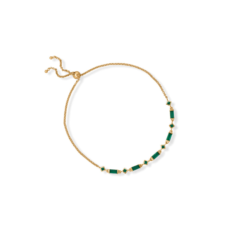 Effortless style? You'll have it in the BAG with this bolo bracelet! 14 karat gold plated sterling silver bracelet features emerald green 2mm x 2mm square and 3mm x 5mm baguette CZs. Bracelet is adjustable up to 11" with a 5mm bead stopper. Pro tip: Mix and match or layer our baguette collection for a BOLDER look! .925 Sterling Silver