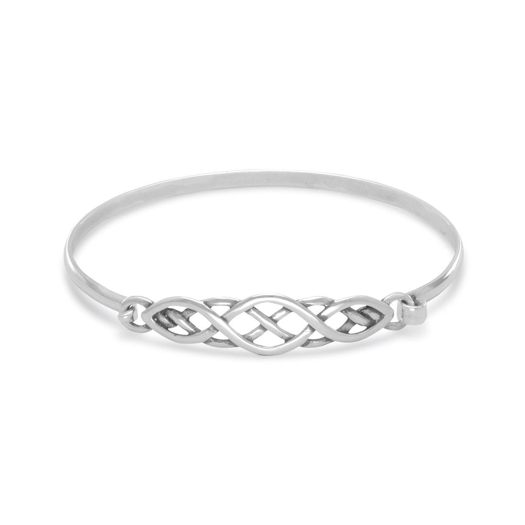Oxidized 3mm wide squeeze release bangle features 7 x 42mm celtic design and hook closure. The bangle has inside measurements of 60mm x 53.5mm.<br>.925 Sterling Silver