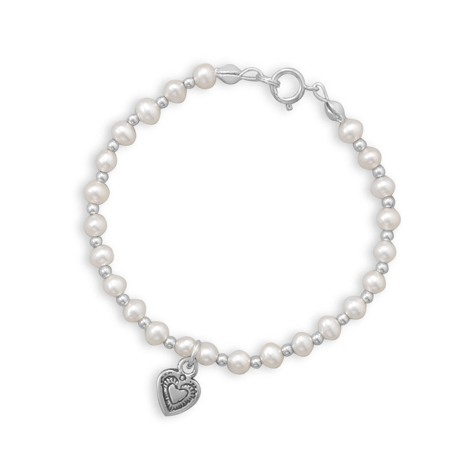 Our exquisite sterling silver bracelet, featuring alternating 4mm cultured fresh water pearls and 2mm silver beads. The bracelet is designed with both sterling silver beads and pearls, creating a harmonious blend of luxury and style. The centerpiece of this bracelet is the oxidized heart drop, adding a touch of romance and charm. Crafted from .925 sterling silver, this bracelet is not only beautiful but also durable and long-lasting. 