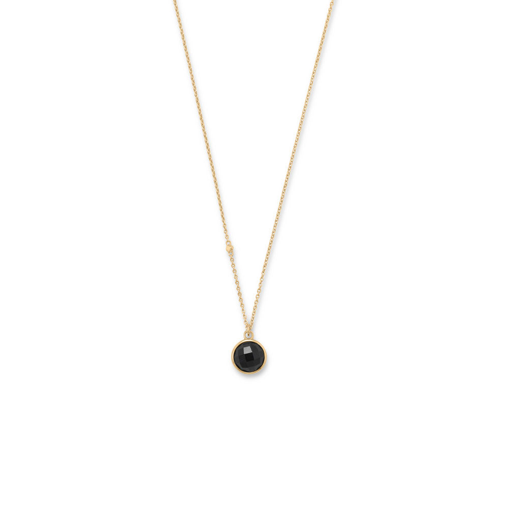 A simple classic with designer detail. 16" + 2" 14 karat gold plated sterling silver necklace features an 9.5mm faceted black onyx charm with a 2mm gold plated bead accent in chain. Necklace is finished with a lobster clasp closure. .925 Sterling Silver