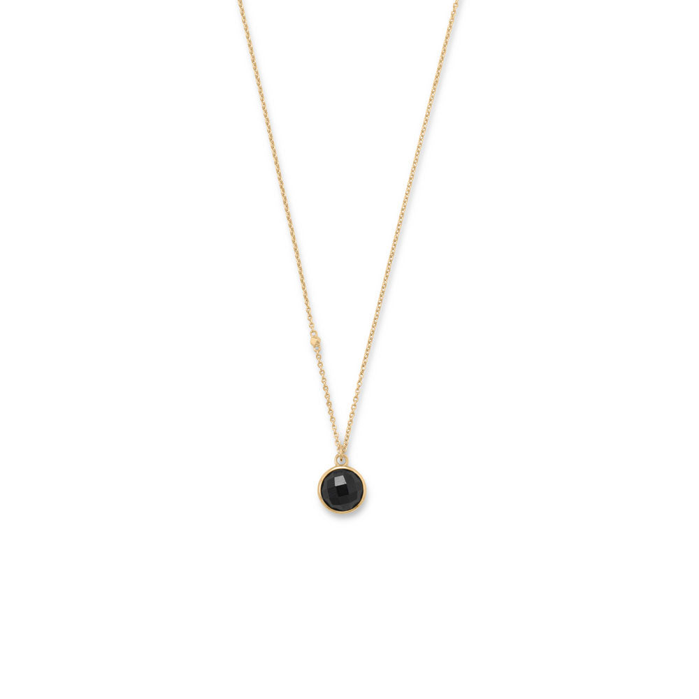 A simple classic with designer detail. 16" + 2" 14 karat gold plated sterling silver necklace features an 9.5mm faceted black onyx charm with a 2mm gold plated bead accent in chain. Necklace is finished with a lobster clasp closure.  .925 Sterling Silver 