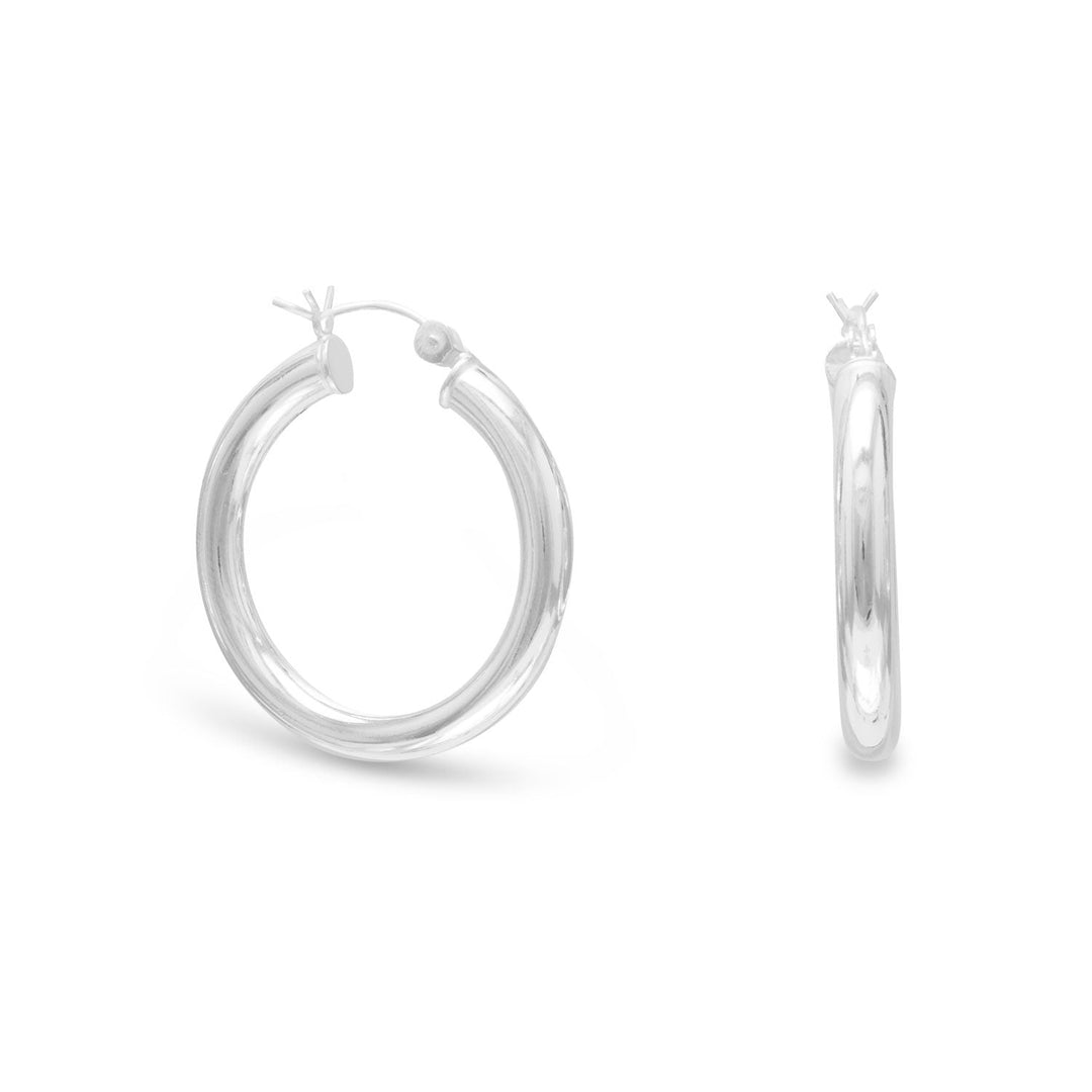 Introducing our exquisite 4mm x 29mm hoop earrings with click hoop closure, crafted from premium .925 Sterling Silver. These earrings are designed with ease of use in mind, featuring a convenient click hoop closure that ensures a secure fit.