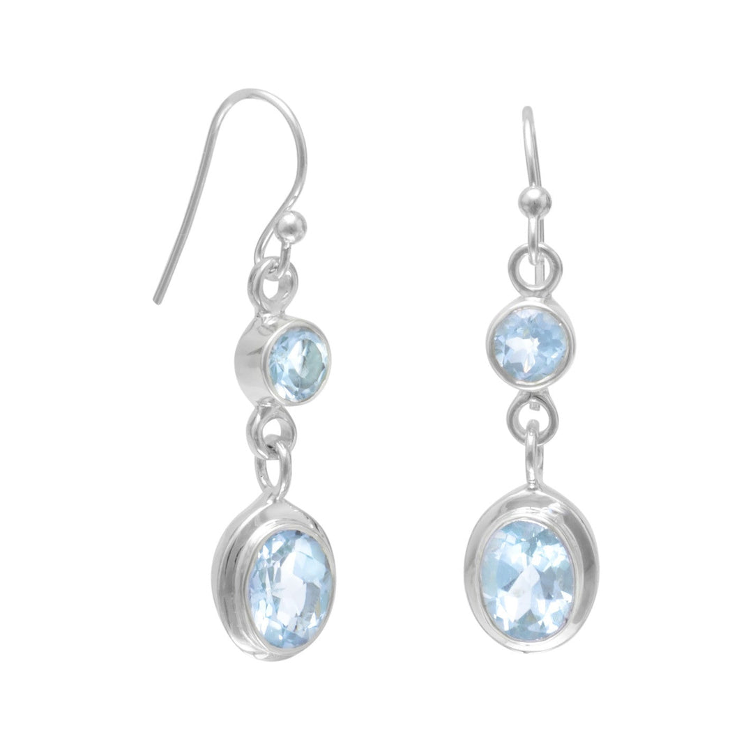 Polished sterling silver french wire earrings features a 9mm x 6mm and a 5mm blue topaz drop. Earrings have a hanging length of 34mm. .925 Sterling Silver