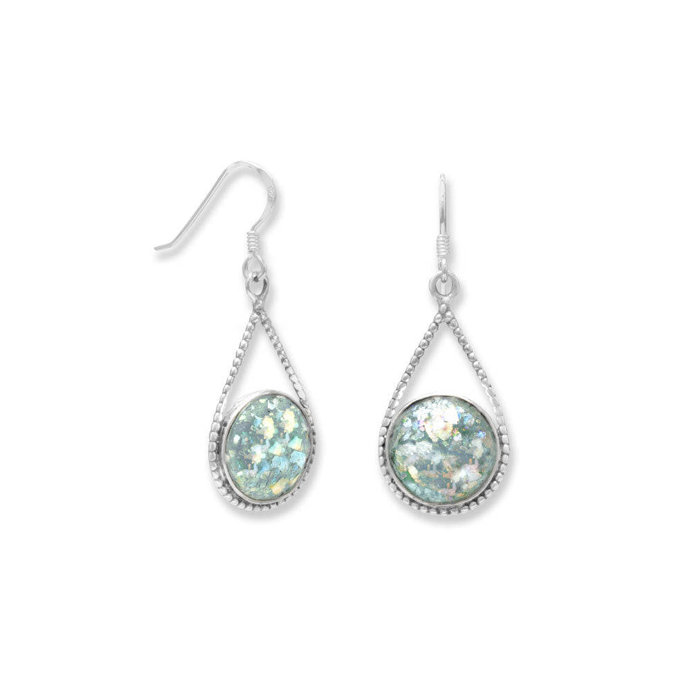 Introducing our exquisite pair of pear shape sterling silver french wire drop earrings, adorned with 11mm round pieces of authentic Roman glass.The earrings hang approximately 37mm. The oxidized sterling silver accents with bali design influence add a unique and intricate touch to the overall design. The Roman glass used in these earrings is of the highest quality and comes with a Certificate of Authenticity.