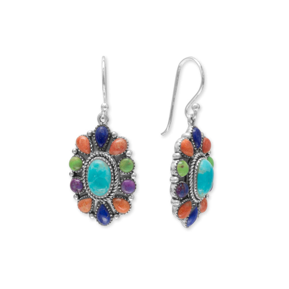 Colorful drops. Oxidized sterling silver french wire earrings with blue reconstituted turquoise, coral, lapis and green and purple reconstituted turquoise. The center turquoise stone is approximately 5mm x 8mm, with 3mm x 5mm pear shape stones and 3mm round stones. The oval earrings hang approximately 35mm. .925 Sterling Silver