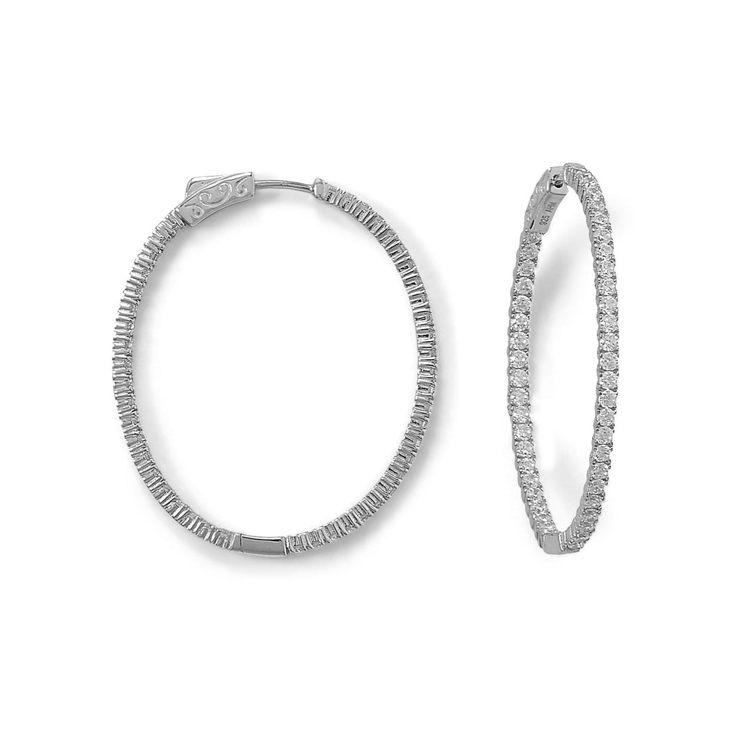 Introducing "Eternal Sparkle" - Embrace timeless elegance with our oval Cubic Zirconia Hoop Earrings. Crafted from rhodium-plated .925 Sterling Silver, these exquisite 43mm x 37mm hoops boast a hidden click closure for effortless style. Elevate your brilliance now!