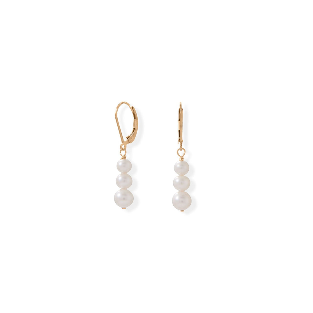Our timeless classic 14 Karat Gold Filled Stacked Pearl Lever Earrings feature three near round, graduated, cultured freshwater pearls. Pearls measure approximately 5mm, 5.5mm, and 6.5mm. The full hanging length is approximately 35.5mm. 14/20 Gold Filled