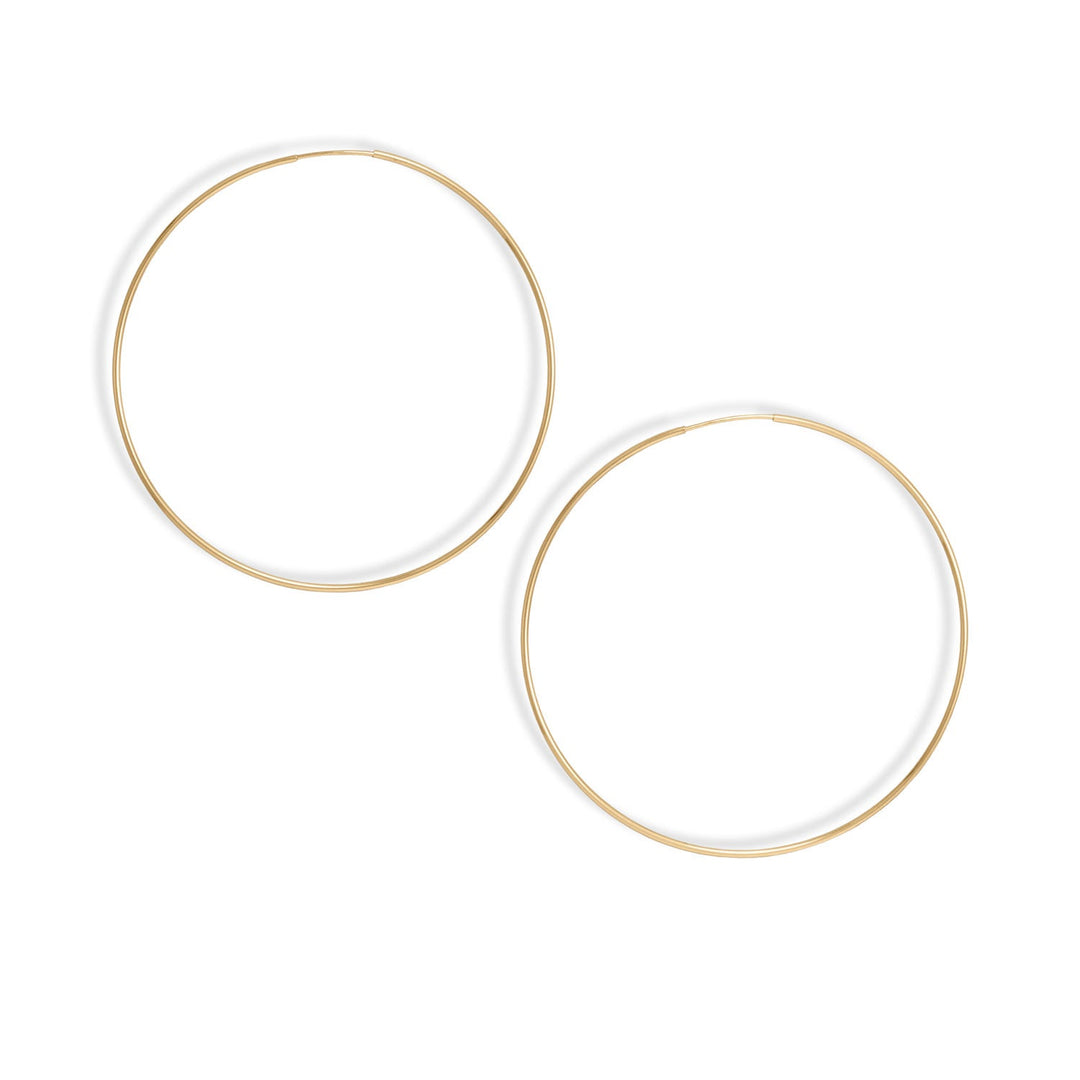 Large and lightweight. 14/20 gold filled endless hoops are 65mm in diameter, tubing is 1.25mm. 14/20 Gold Filled