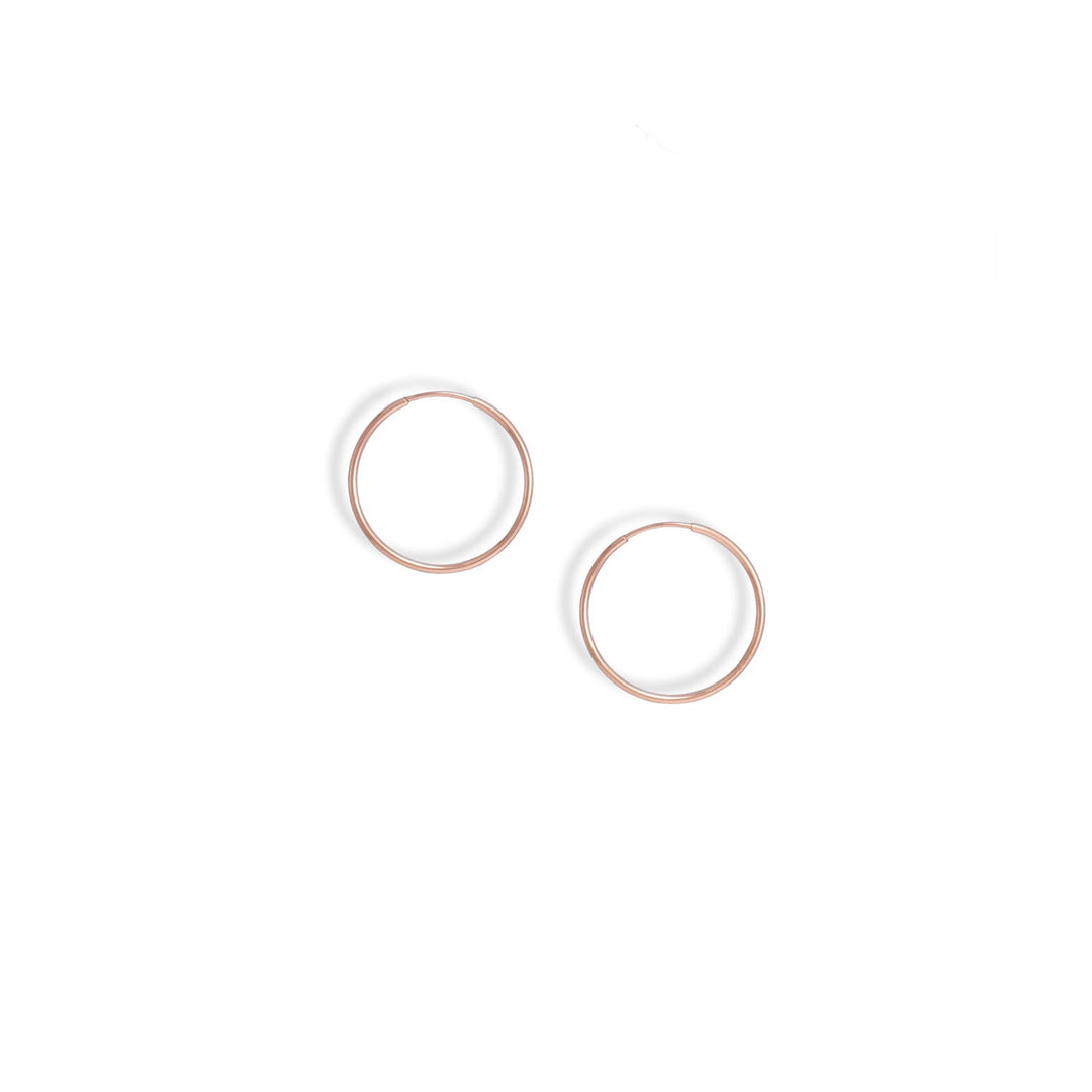 For all of the rose gold lovers. 14/20 rose gold filled endless hoops are 24mm in diameter, tubing is 1.25mm.<br>14/20 Gold Filled