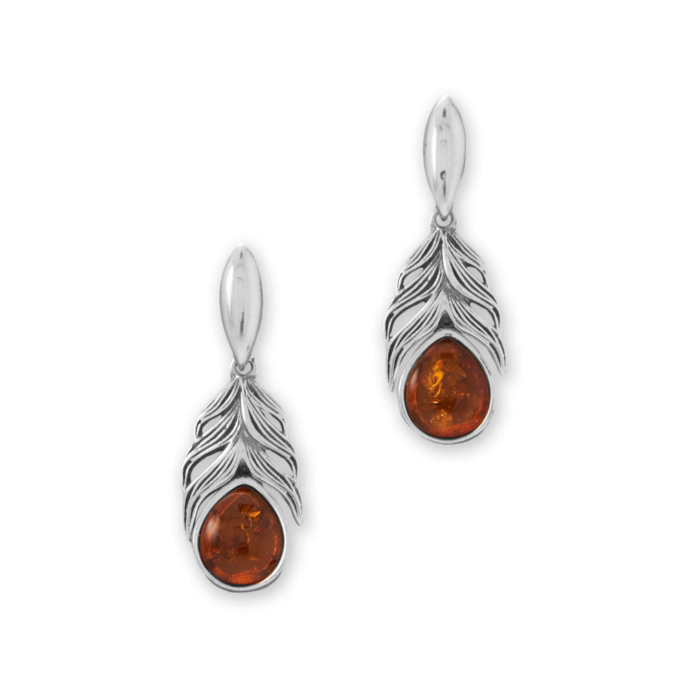 Classic amber design! Oxidized sterling silver feather post back hinged earrings feature 7.5mm x 6mm genuine Baltic amber drops. Earrings have a total hanging length of 26.8mm. Genuine Baltic amber is from Poland .925 Sterling Silver