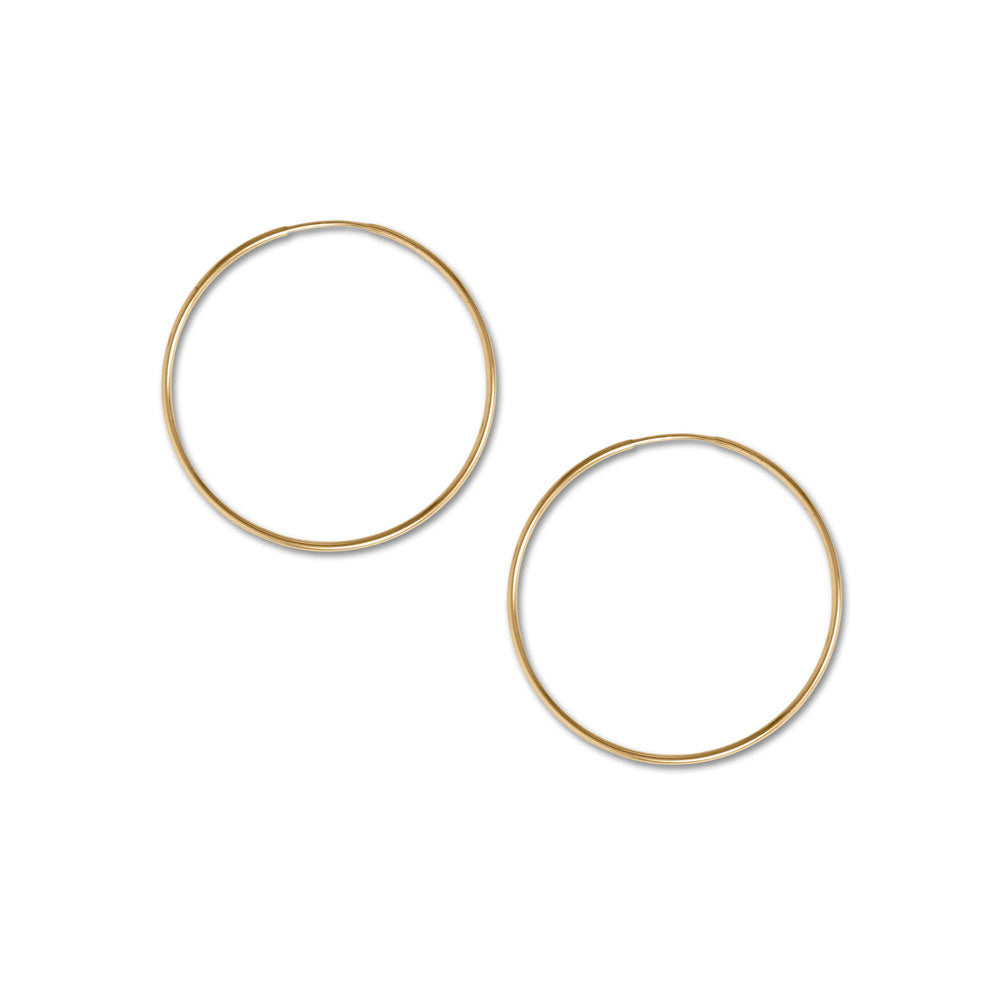 A minimalist's dream. 14/20 gold filled endless hoops are 38mm in diameter, and tubing is 1.25mm. 14/20 Gold Filled
