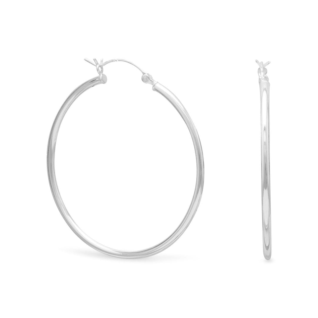 Introducing our exquisite 2mm x 40mm hoop earrings hoop earrings, crafted from premium .925 sterling silver. These earrings are designed to make a bold statement, drawing the attention of onlookers to your face. The 40mm hoop earrings of the hoop is perfectly proportioned to enhance your features and elevate your style.