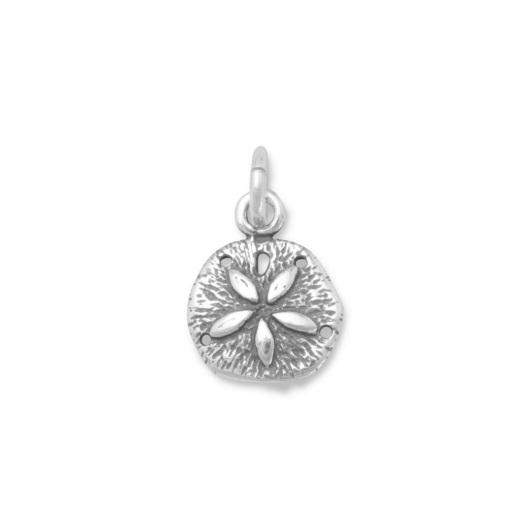 Oxidized Sterling Silver Sand Dollar Charm 14mm x 9.5mm oxidized sterling silver sand dollar charm. .925 Sterling Silver