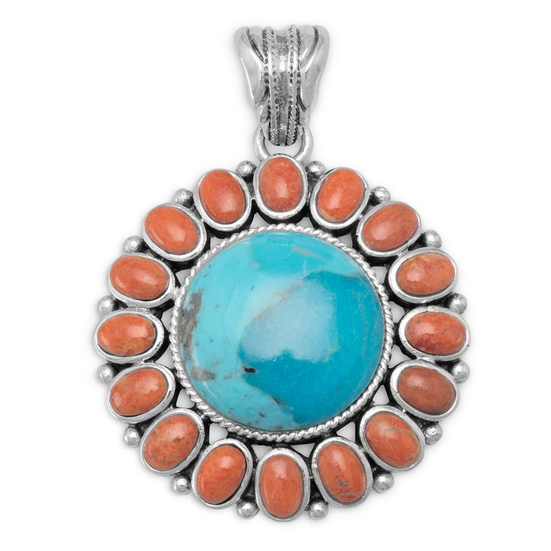 Oxidized sterling silver pendant with a reconstituted turquoise and orange coral sunburst design. The turquoise stone is 18mm, and is surrounded by 5mm x 6mm orange coral stones. The pendant hangs approximately 2 inches..925 Sterling Silver