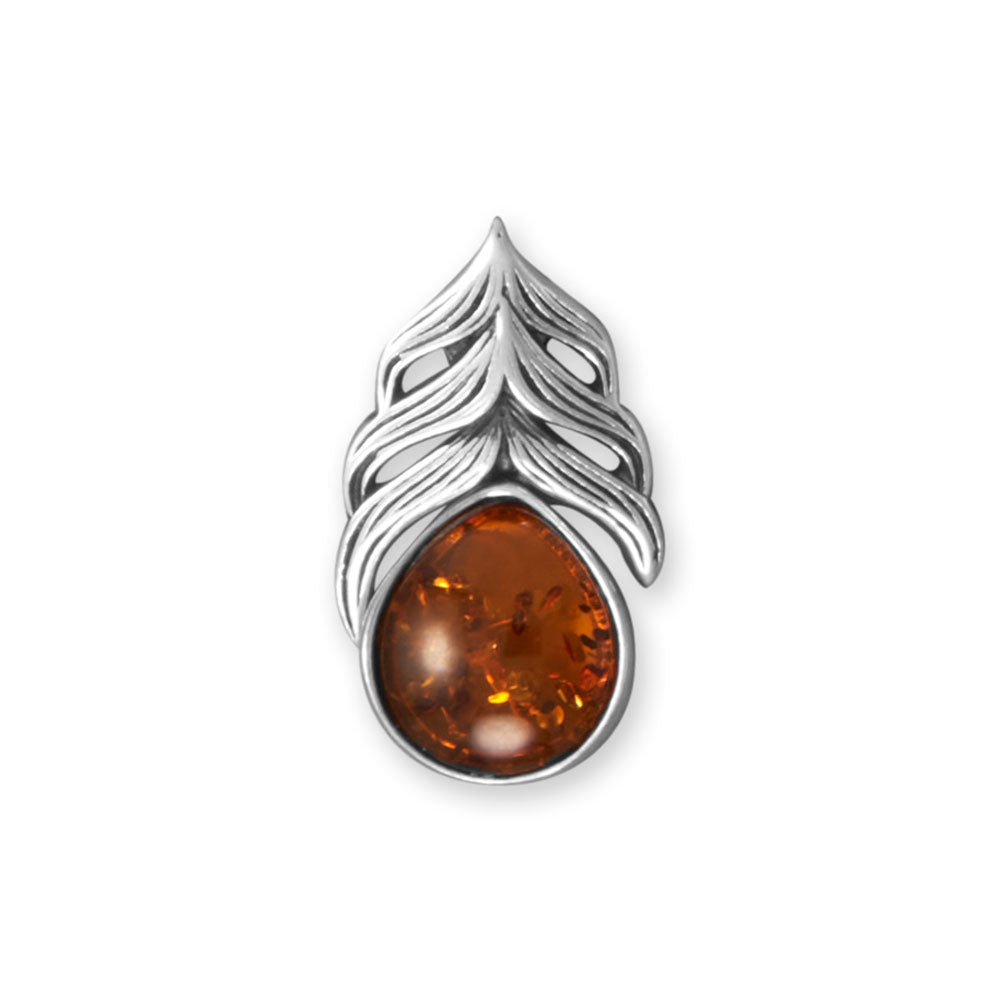 Our Classic Amber Design, a stunning piece of jewelry that exudes simple elegance. Crafted from .925 sterling silver, this pendant features an oxidized feather slide that showcases a hinged 8.7mm x 9.9mm genuine Baltic amber drop. Measuring 12.5mm x 21.5mm. Baltic amber is a fossilized resin . Our genuine Baltic amber is sourced from Poland.