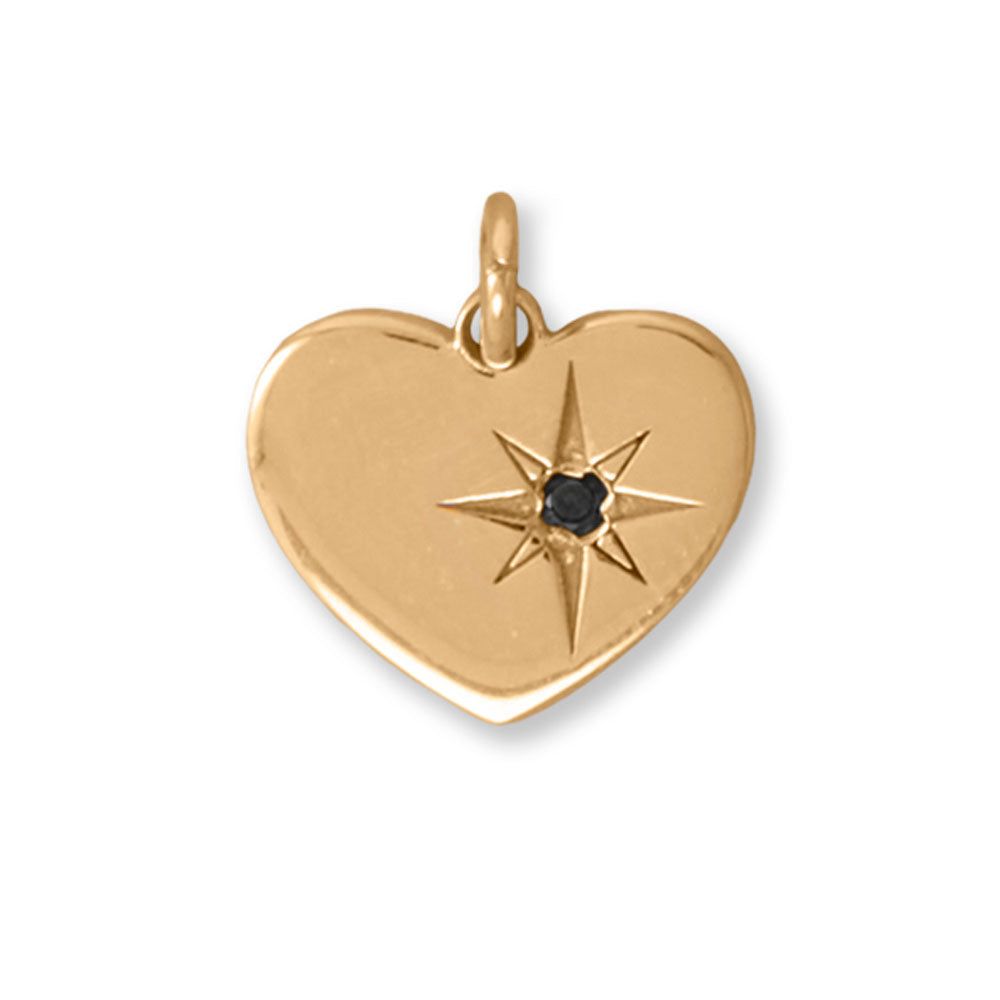 A rare find for a rare person! 14 karat gold plated sterling silver heart pendant has a starburst design with black diamond accent detail. Pendant is 11.3mm x 9.8mm, and black diamond is 1.5mm. .925 Sterling Silver