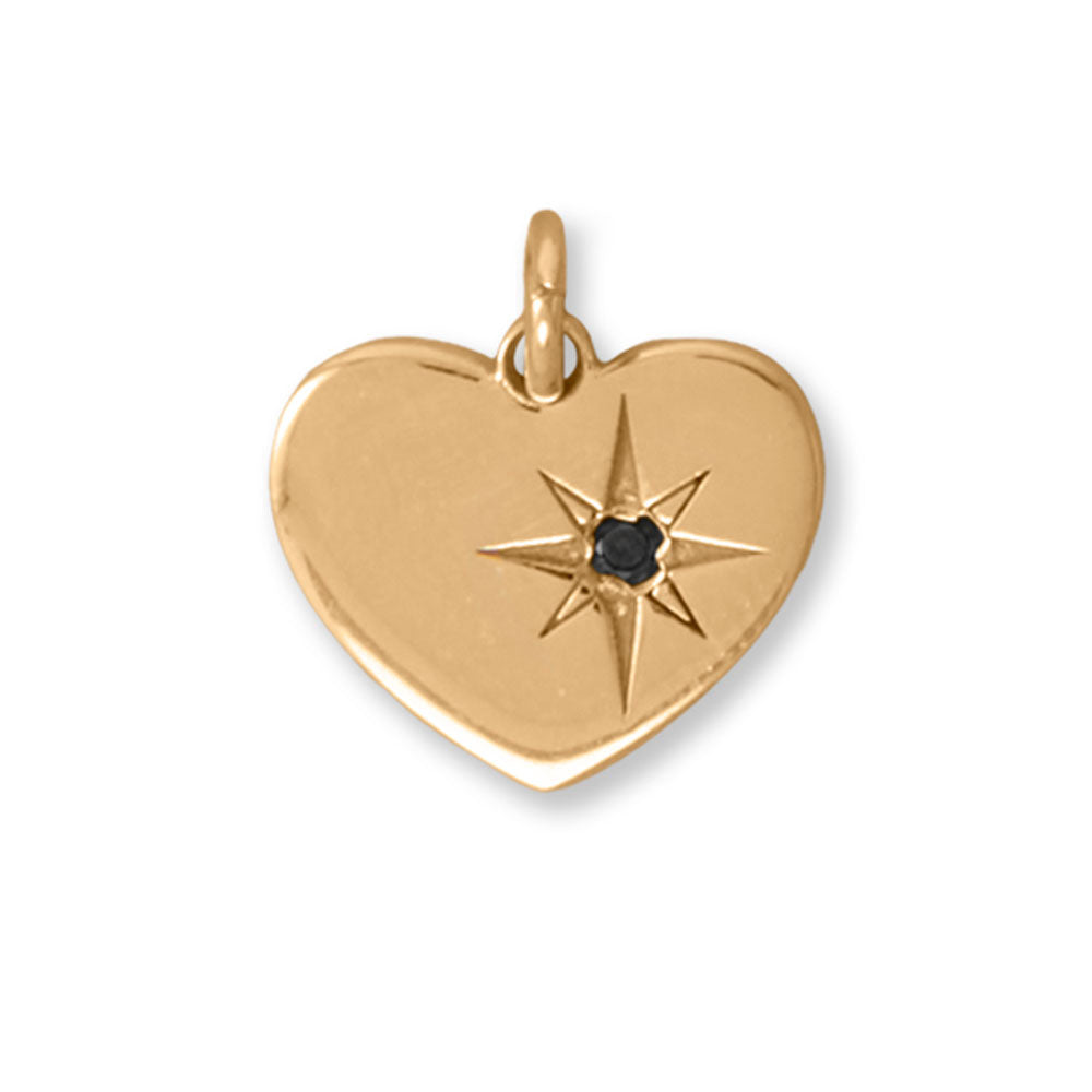 A rare find for a rare person! 14 karat gold plated sterling silver heart pendant has a starburst design with black diamond accent detail. Pendant is 11.3mm x 9.8mm, and black diamond is 1.5mm. .925 Sterling Silver 
