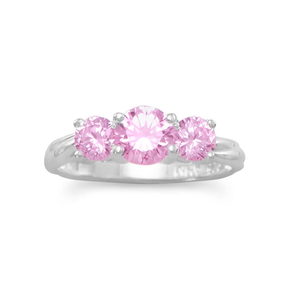 Introducing our exquisite 'Pretty 'n Pink' ring, crafted from .925 Sterling Silver. Adorned with a captivating 6mm round pink cubic zirconia, complemented by 4.5mm round pink cubic zirconias on each side. A mesmerizing combination of elegance and opulence that will undoubtedly captivate all onlookers. Available in whole sizes 4-10, this luxurious piece is a testament to the timeless allure of pink cubic zirconias against the backdrop of sterling silver.