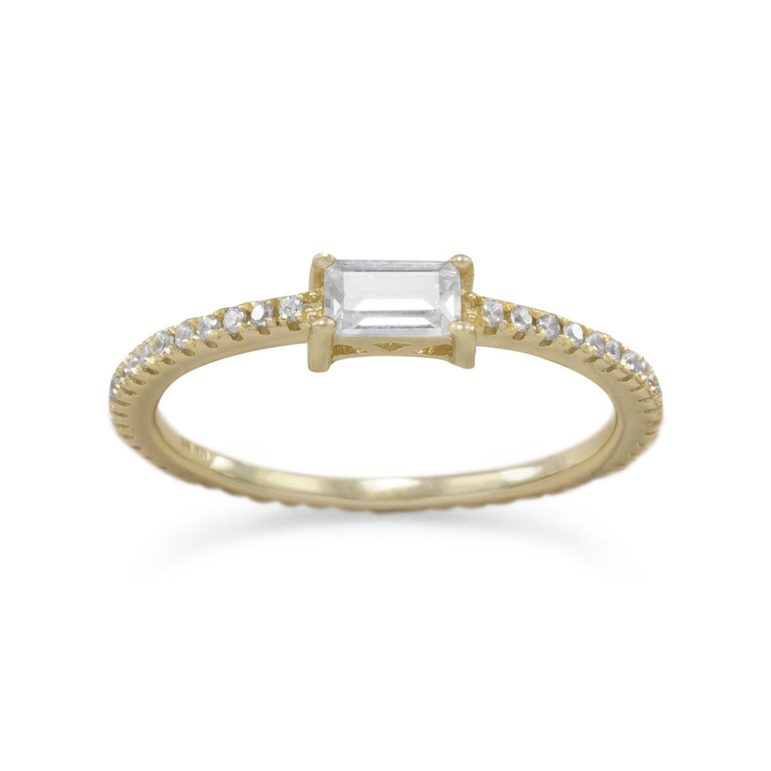Indulge in luxury with our 14K gold plated sterling silver ring. Featuring a stunning 2mm x 4mm rectangular center cubic zirconia and encrusted with 1mm cubic zirconias, it's sure to turn heads. Get the million-dollar look without breaking the bank. Available in sizes 5-9.