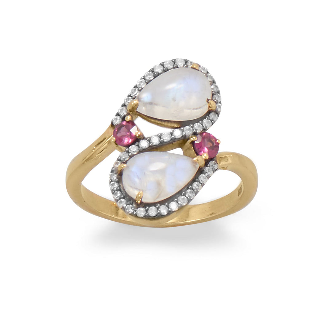Introducing our stunning ring, adorned with a mesmerizing pear rainbow moonstone, round rhodolite, and sparkling cubic zirconias. Crafted with 14 karat gold plated sterling silver, this piece is a true gem. Available in sizes 6-9, it perfectly complements our gold and gemstone jewelry collection.