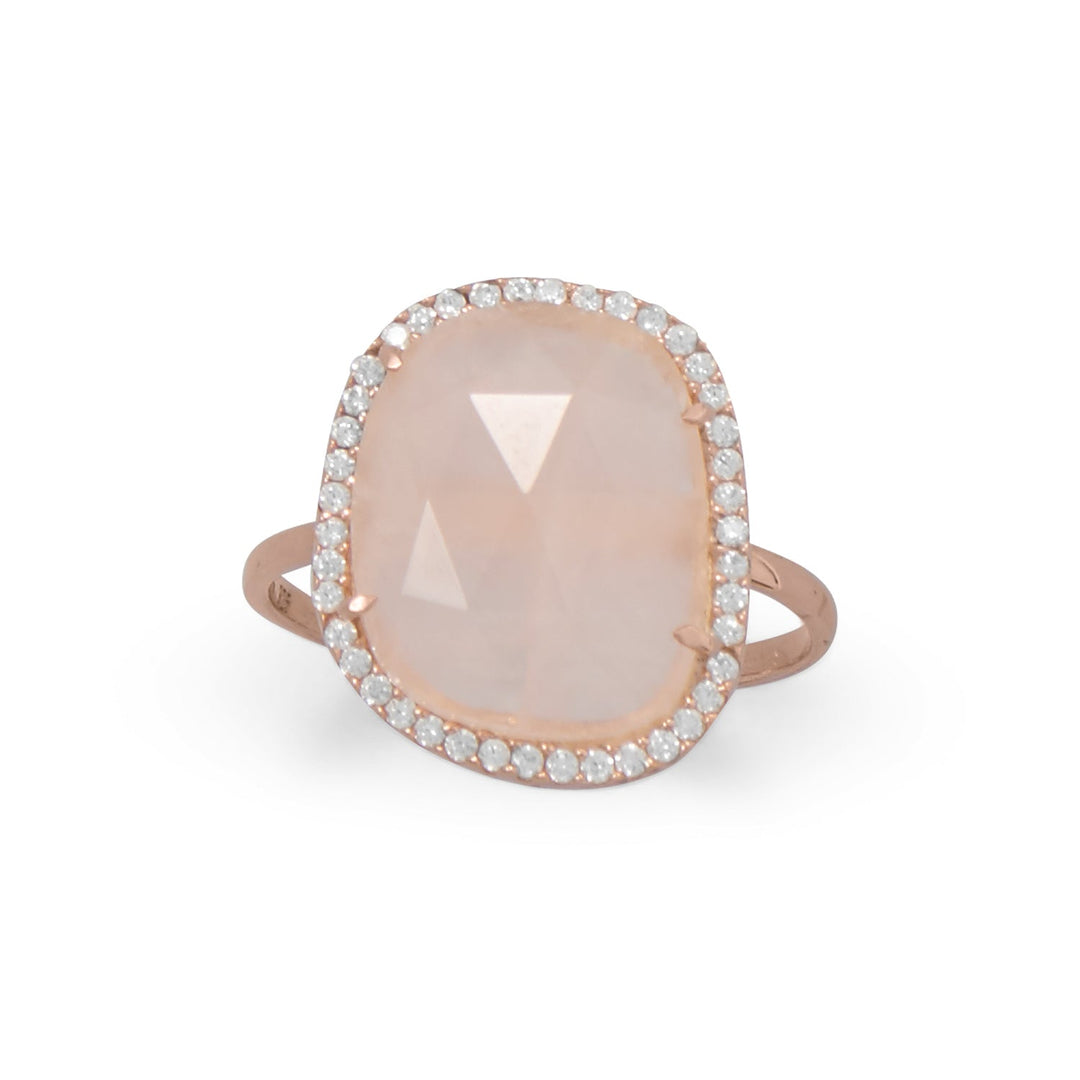 Our stunning 14 karat gold plated sterling silver ring, featuring a mesmerizing 12mm x 14mm faceted rose quartz. Adorned with delicate 1mm cubic zirconias, this ring will surely draw attention to your hands. The gold plating adds both beauty and value to this exquisite piece. With a band measuring approximately 1.5mm, this ring is available in whole sizes 6-9. Crafted from .925 Sterling Silver, it is a great gift for a loved one and pairs perfectly with our other rose quartz jewelry pieces.