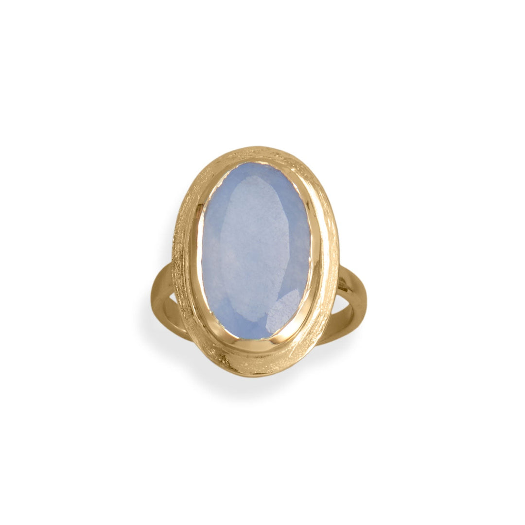 Make a statement with our stunning 14k gold plated sterling silver ring featuring a periwinkle chalcedony stone. The 18mm x 10mm gemstone is set in a 2.6mm band with a width of 14mm. Available in sizes 6-10, it pairs perfectly with our gold and chalcedony jewelry collection.
