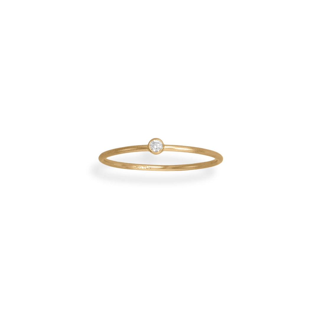 Introducing the 14/20 Gold Filled 1mm Ring, a minimalistic yet impactful piece of jewelry that is sure to elevate any ensemble. Crafted with precision and care, this ring boasts a 2mm 3A quality cubic zirconia.Available in whole sizes 5-8, this ring is designed to fit comfortably on any finger.