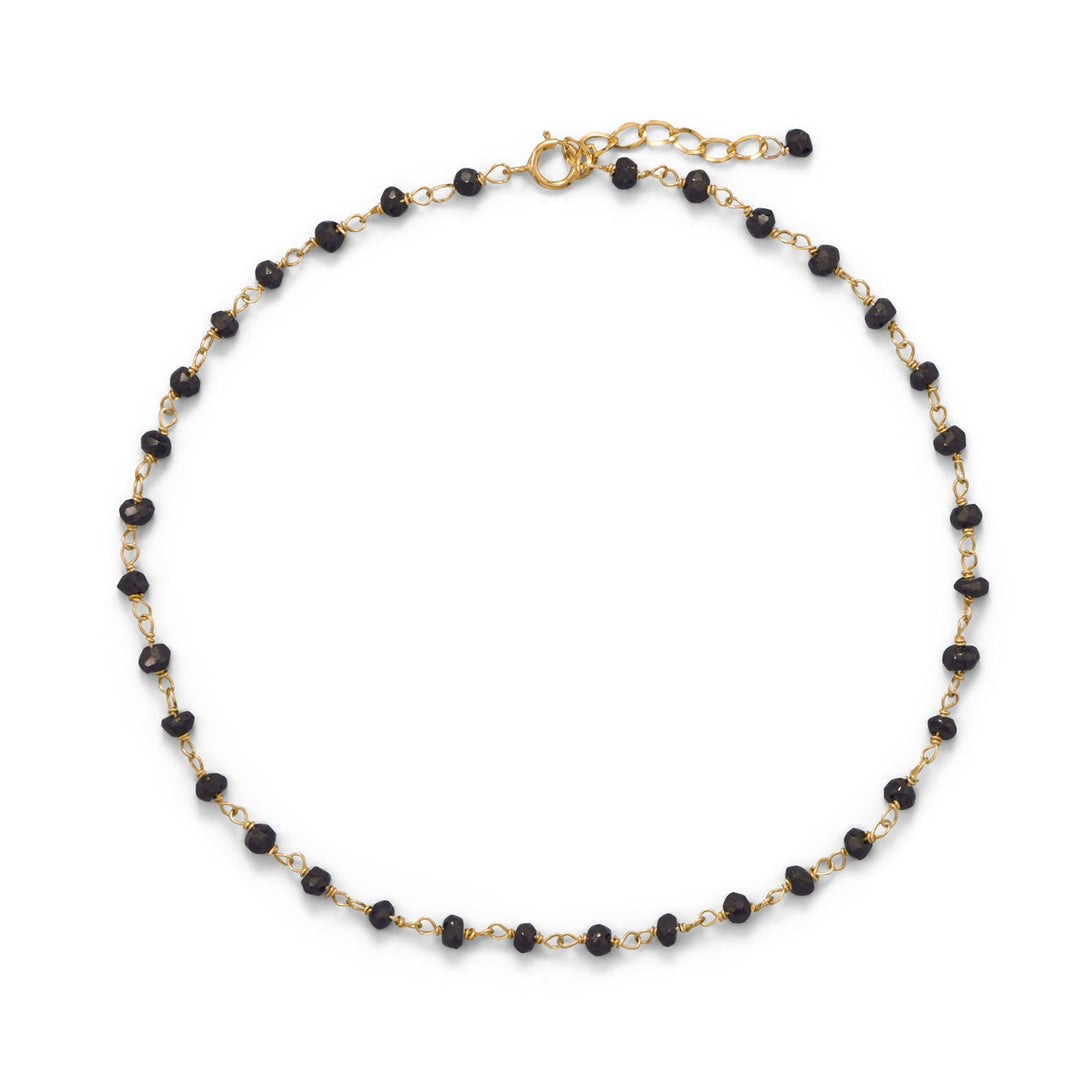 Midnight sparkle! The black spinel beads add lots of shimmer. 9.5" anklet with a 1" extension. 14 karat gold plated sterling silver chain features black spinel beads that measure 2mm x 3mm. Spring ring and extension chain are 14/20 gold filled.