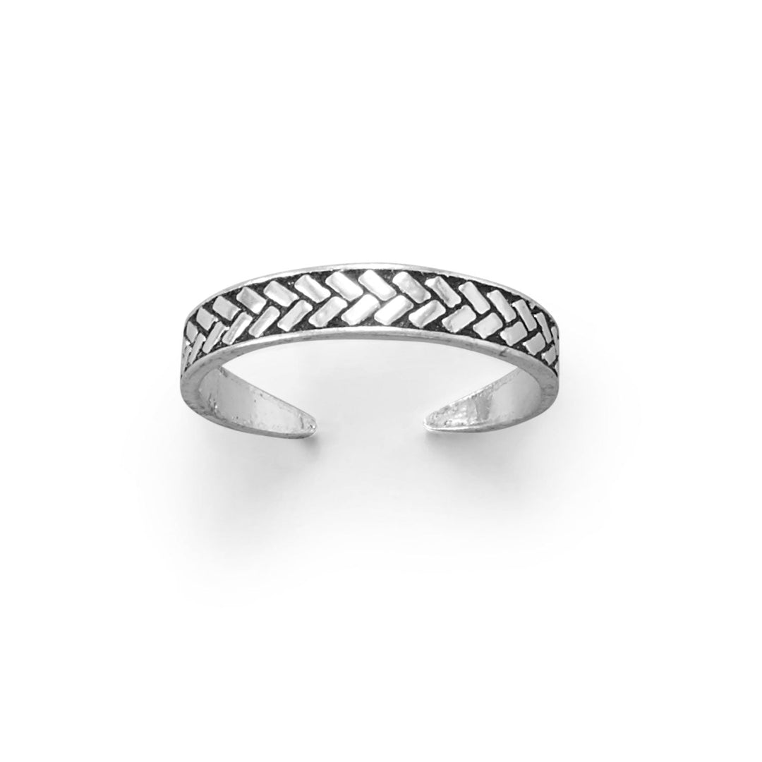 Experience the beauty of nature with our exquisite Thin Wheat Pattern Design Adjustable Toe Ring. Crafted from premium .925 sterling silver, this stunning piece boasts a delicate and intricate wheat pattern design that is beautifully accentuated by the oxidized finish. This adjustable ring symbolizes nature's bounty and abundance, this timeless piece is durable and long-lasting, making it a must-have for any jewelry lover.