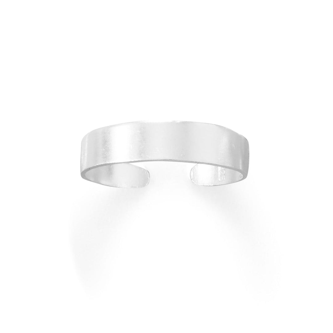 Introducing the Adjustable Polished Sterling Silver Flat Band Toe Ring, a stunning piece of jewelry that exudes elegance and sophistication. Crafted from .925 sterling silver, this toe ring boasts a polished finish that adds a touch of glamour to any outfit. Measuring approximately 4mm wide, this flat band toe ring is adjustable, ensuring a comfortable and secure fit for all wearers.