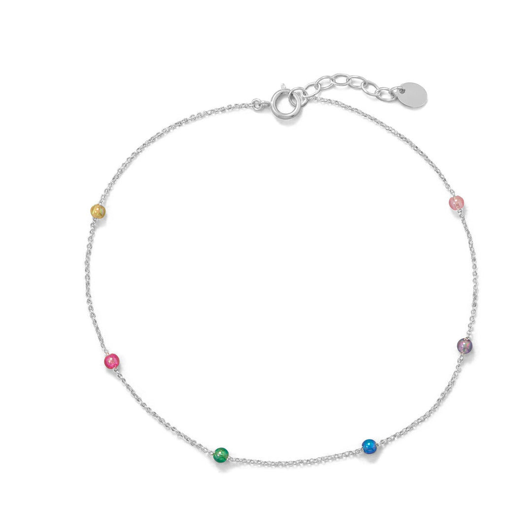 Introducing our vibrant anklet that will add a splash of color to your every step! Crafted with .925 sterling silver, this 9.25"+1" beauty showcases a rainbow of 3mm plastic beads. Secure it with the convenient spring ring closure. Get ready to embrace endless possibilities!