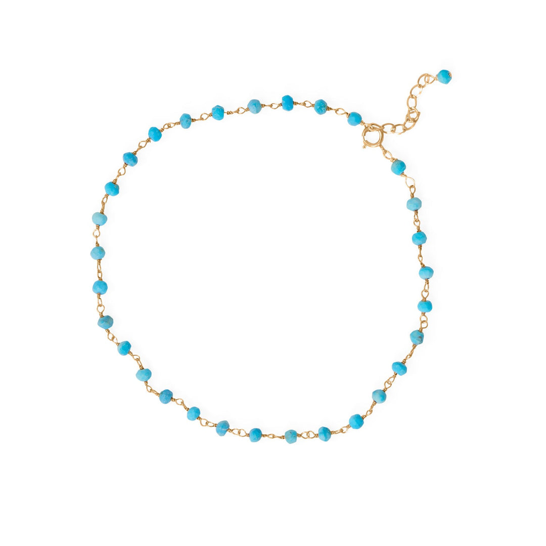 Say goodbye to dull summer days and hello to a pop of color with our stunning anklet! Made with 14 karat gold plated sterling silver and adorned with 3.2mm synthetic turquoise beads, this 9.5" beauty is sure to turn heads. Plus, the 1" extension ensures a perfect fit. Get ready to shine!