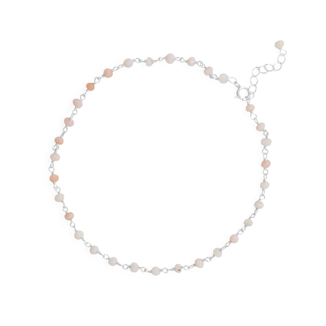 Be the life of the party and show off your sweet summer style with this pretty anklet! 9.5" Sterling silver anklet features 1" extension and 2.6mm x 3.3mm pink opal beads. .925 Sterling Silver