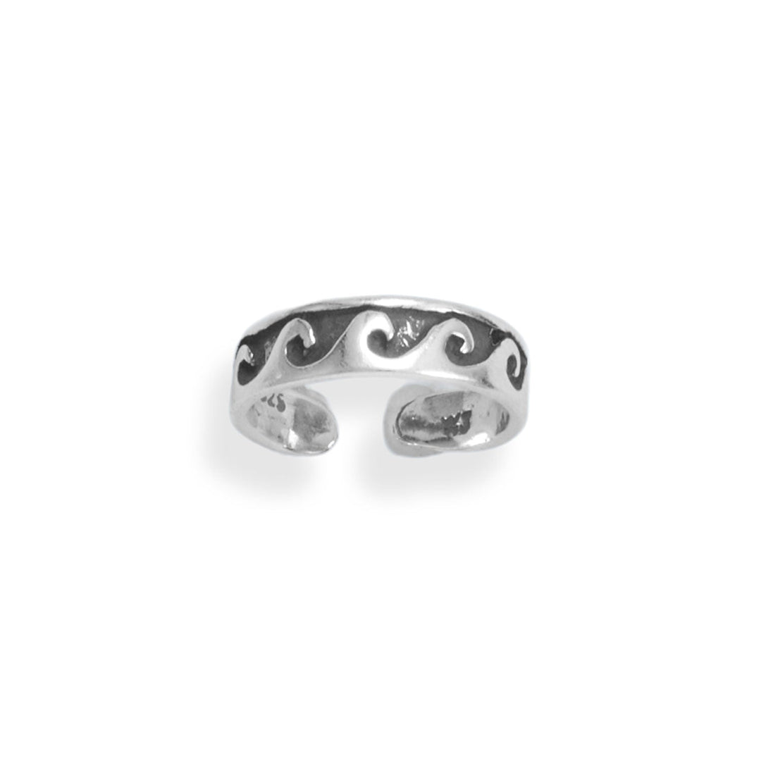 "Make a splash this summer with our stunning Oxidized Sterling Silver Thin Waves Design Toe Ring! Crafted from .925 sterling silver, this elegant piece features a beautiful wave design that adds a touch of summer fun to any outfit. The oxidized finish enhances the intricate details, making it a true work of art. With its adjustable open design, this toe ring is the perfect fit for any foot.