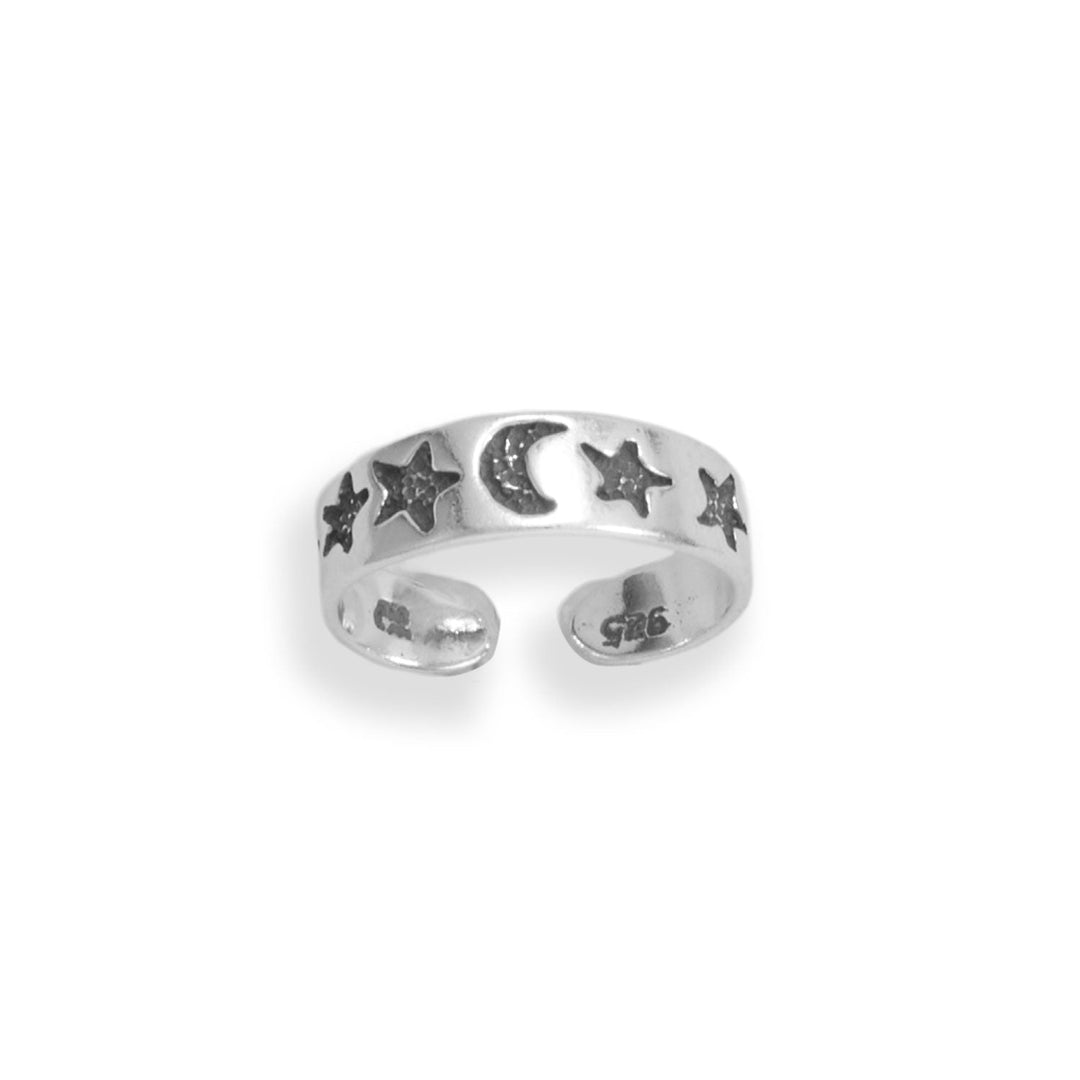 "Get ready to shine like the cutest star in the galaxy with our Oxidized Sterling Silver Moon and Star Design Toe Ring! Crafted from oxidized .925 sterling silver, this stunning piece of jewelry is the perfect addition to any summer ensemble. Measuring approximately 4.8mm, this adjustable toe ring ensures a snug and secure fit. Invest in the beauty of summer fun with our timeless piece of jewelry today!"