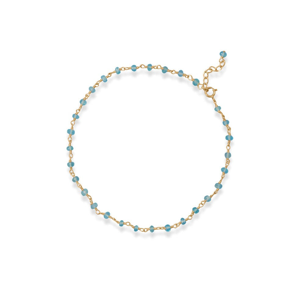 Indulge in opulence with our exquisite 14k gold plated sterling silver hand beaded chain, adorned with stunning 2.5mm x 3mm apatite beads. The handcrafted chain is secured with a spring ring closure, ensuring safety and security. Measuring 9.5" with a 1" extension, this anklet pairs perfectly with our other sea breeze blue apatite beaded jewelry pieces. Crafted from .925 sterling silver, this piece is a true treasure.