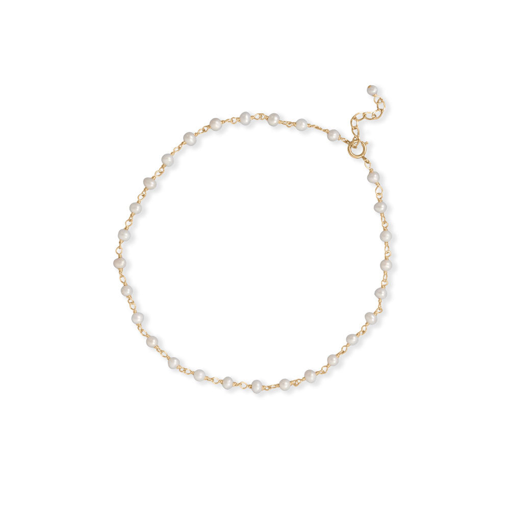 14 karat gold plated sterling silver hand beaded chain features 3.5mm cultured freshwater pearls and is finished with a spring ring closure. Anklet measures 9.5" with a 1" extension..925 Sterling Silver