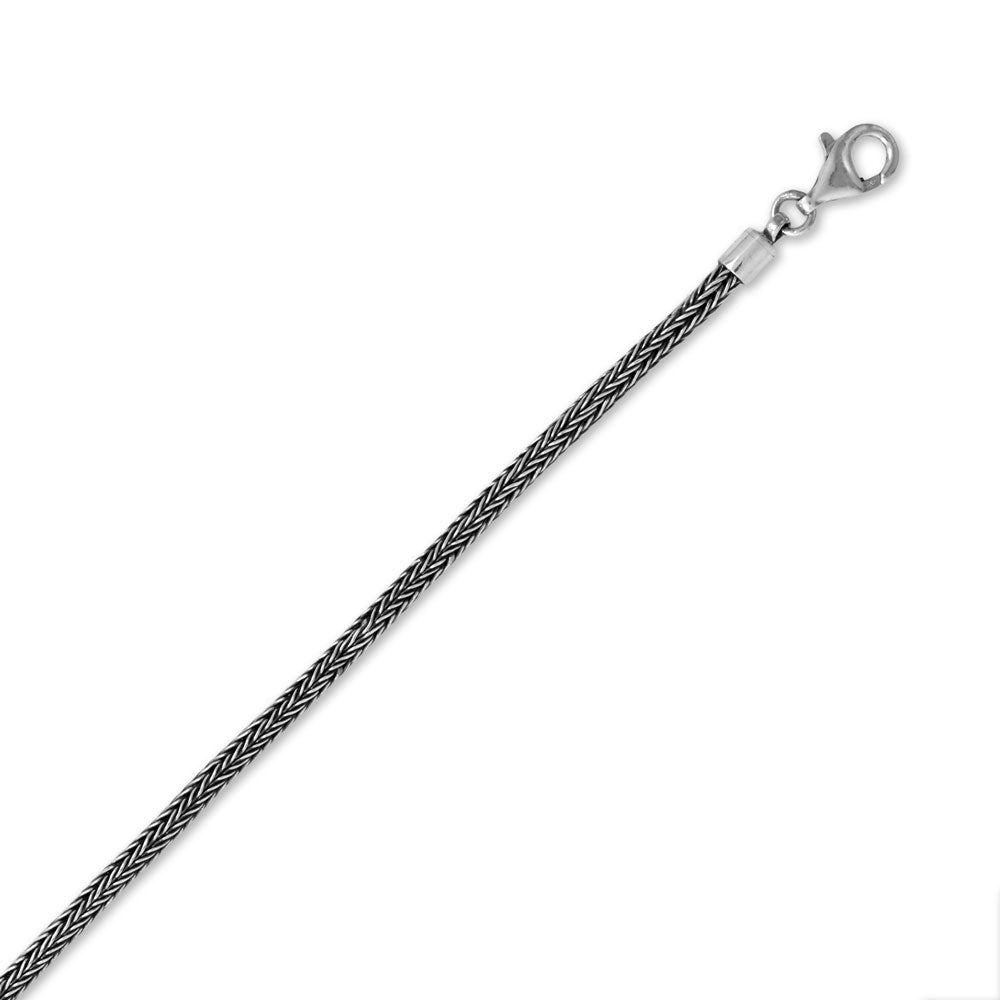 Introducing our impressive 3mm Oxidized Bali Wheat Chain, also known as the Tulang Naga chain, symbolizing the backbone of a dragon. This sterling silver masterpiece features a lobster clasp closure and showcases the stunning and intricate handmade wheat chain design. Handcrafted in exotic Bali, Indonesia, this .925 sterling silver chain is a beautiful gift for any fashion discerning gentlemen in your life.
