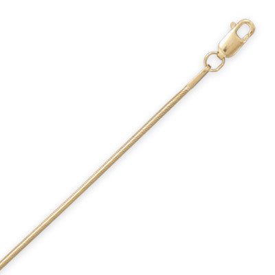 Indulge in the opulence of our 1mm 14/20 gold filled snake chain. Its sleek design exudes elegance and sophistication, while the gold filling adds value and beauty. Finished with a lobster clasp closure for safety and security, this chain has a variety of lengths that measure 16-30 inches. Wear it alone or pair it with any of our exquisite gold charms or pendants. Crafted from .925 sterling silver, this chain is a true luxury statement piece.