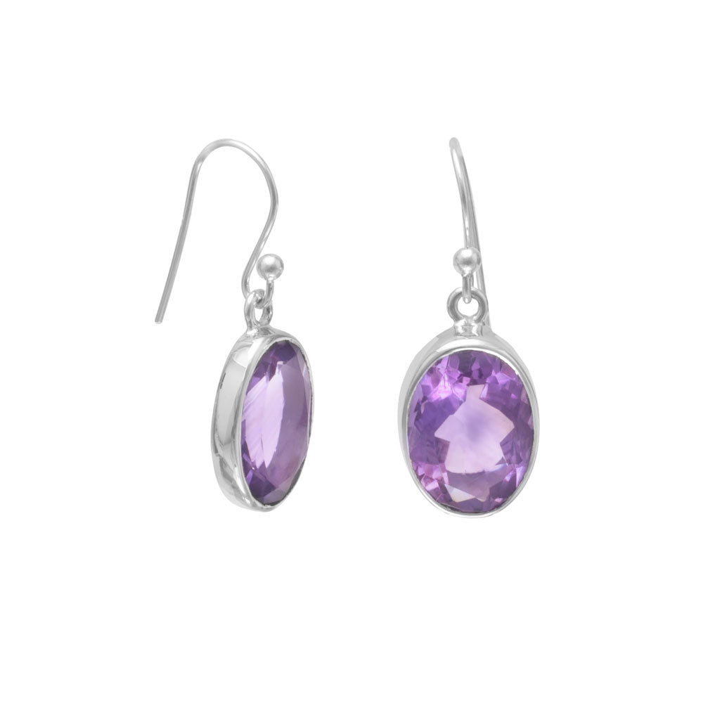 Sterling silver earrings feature oval faceted amethyst. Stones are approximately 14mm x 10mm. .925 Sterling Silver