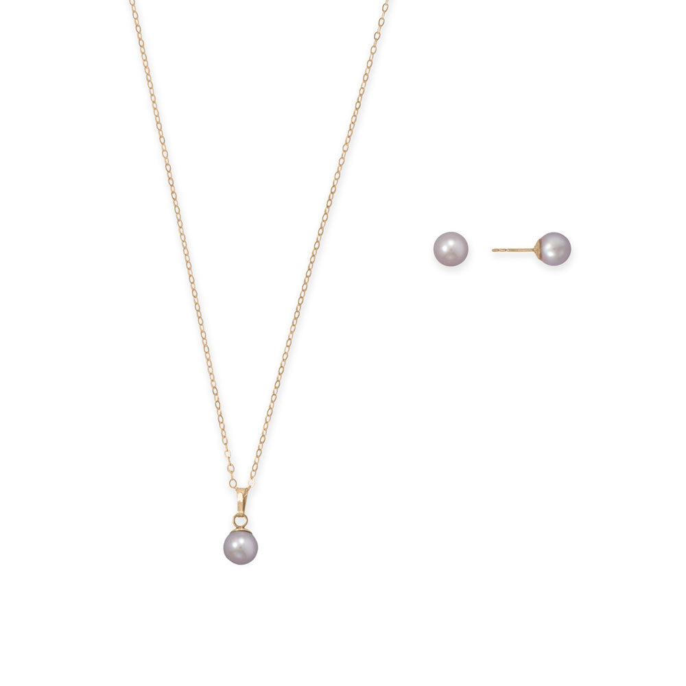 A picture perfect set! 6.5mm natural color cultured freshwater pearl set includes gold filled stud earrings and a 16" gold filled necklace. Necklace is finished with a spring ring. Pearls will vary among sets, from peach to pink to lavender but will match within the set.